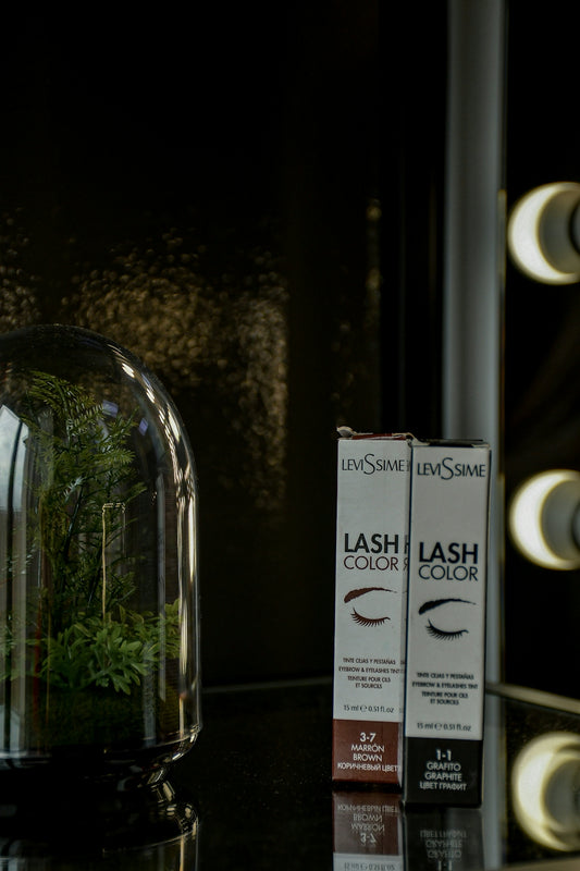 Two boxes of lash color with a terrarium.